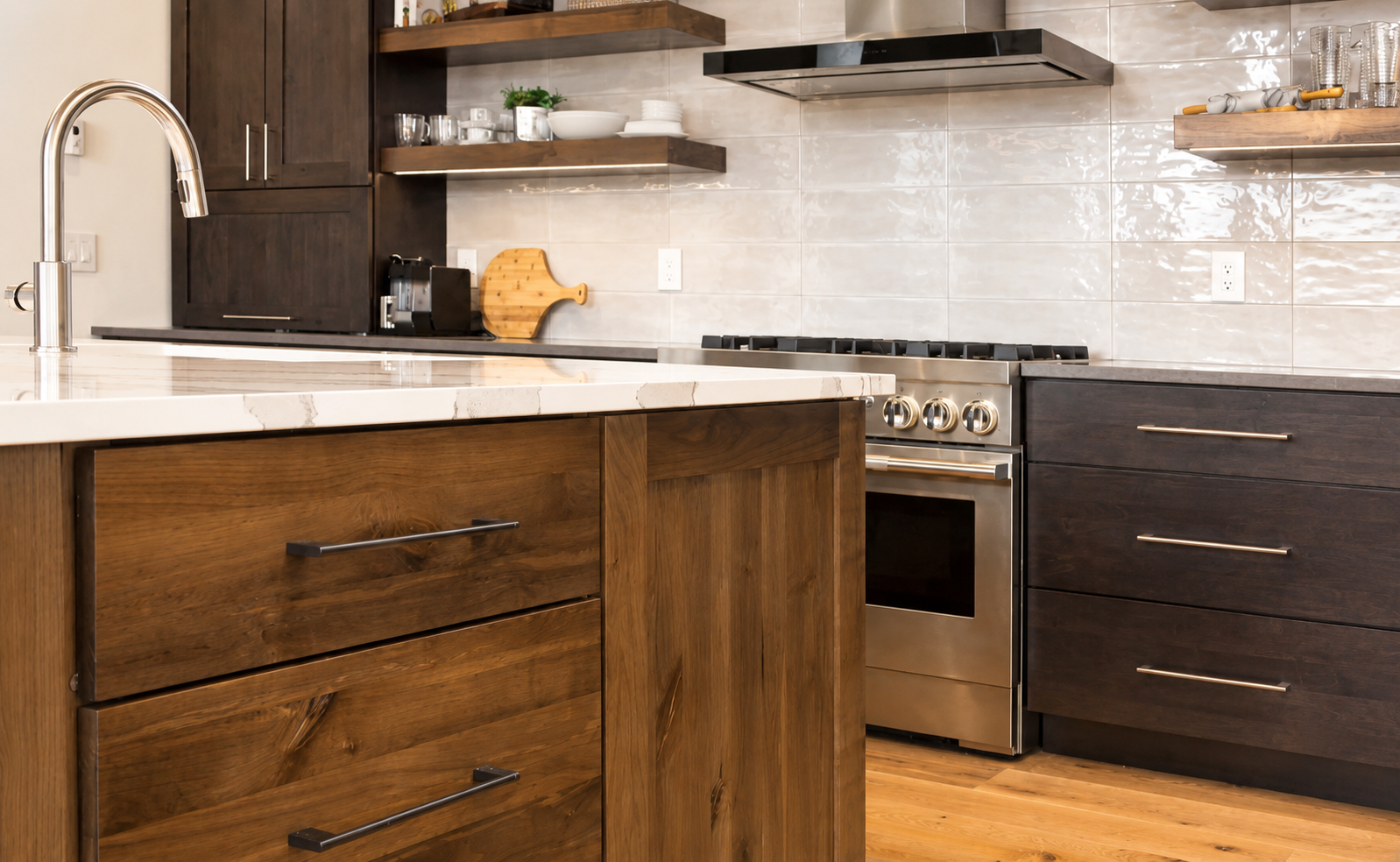 Detail of custom wood cabinetry and marble countertop